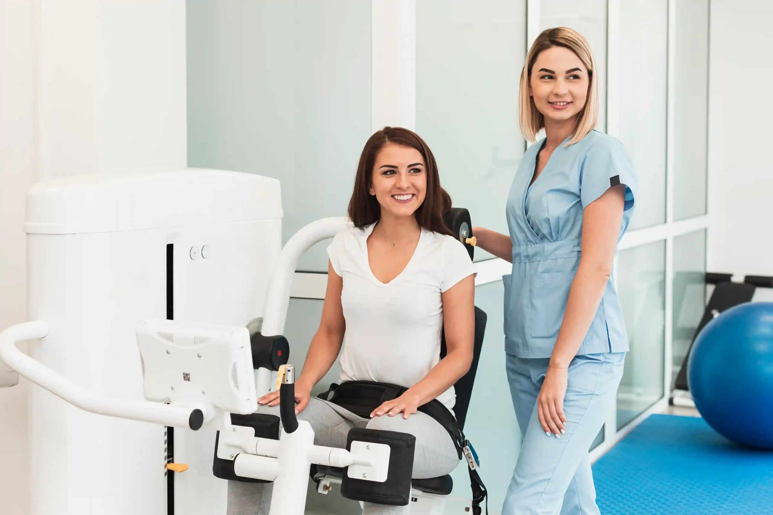 Clinician using medical equipment for patient health monitoring and labs.
